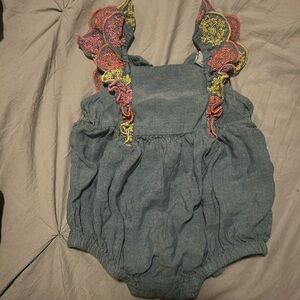 Ruffled baby onesie